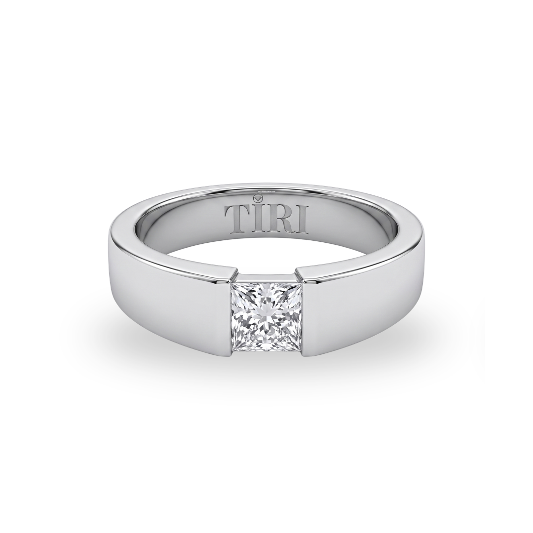 Tiri Quadrant Solitaire men's diamond ring featuring a central diamond set in a sleek metal band.