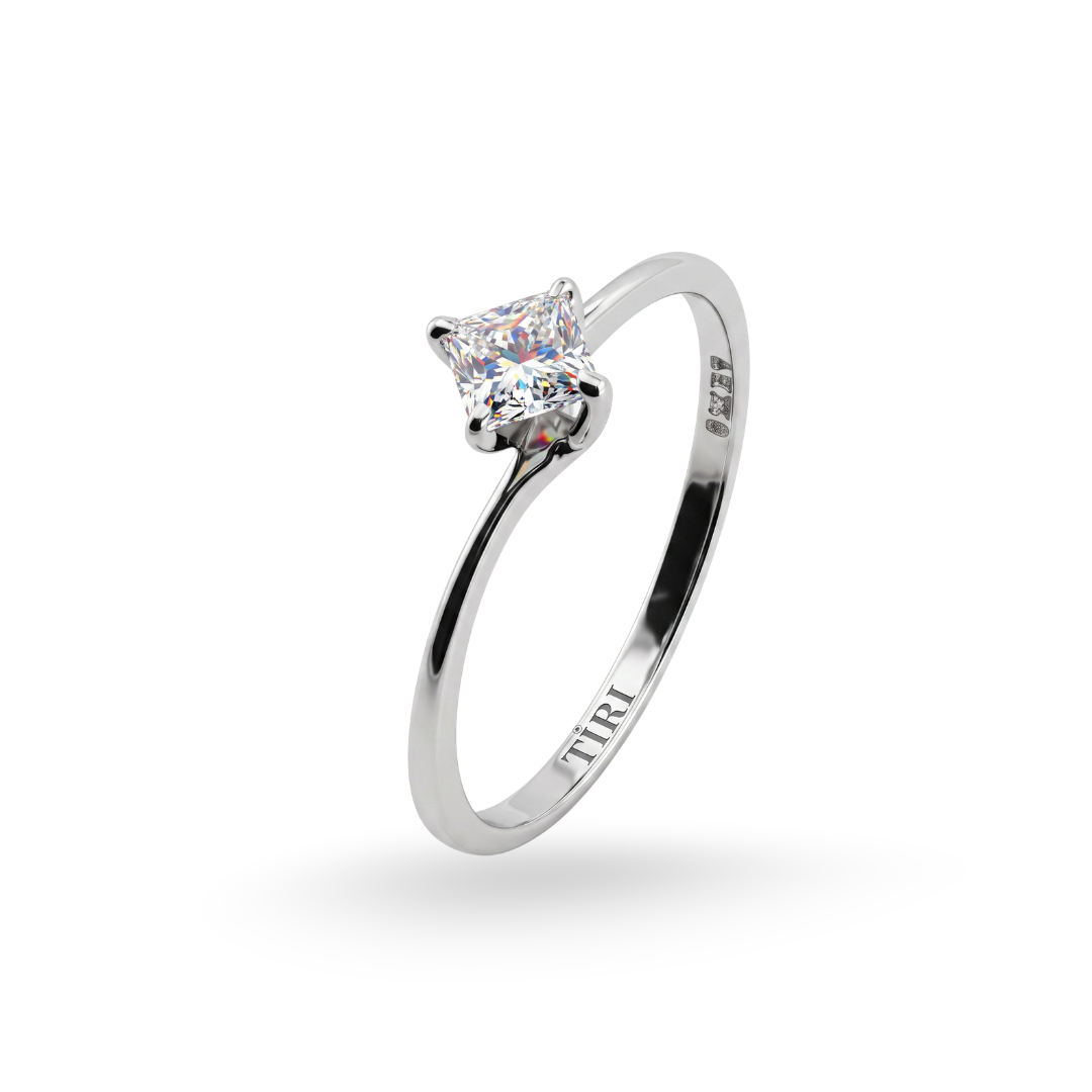 Tiri princess cut solitaire diamond ring featuring a sparkling central diamond set in a sleek band.
