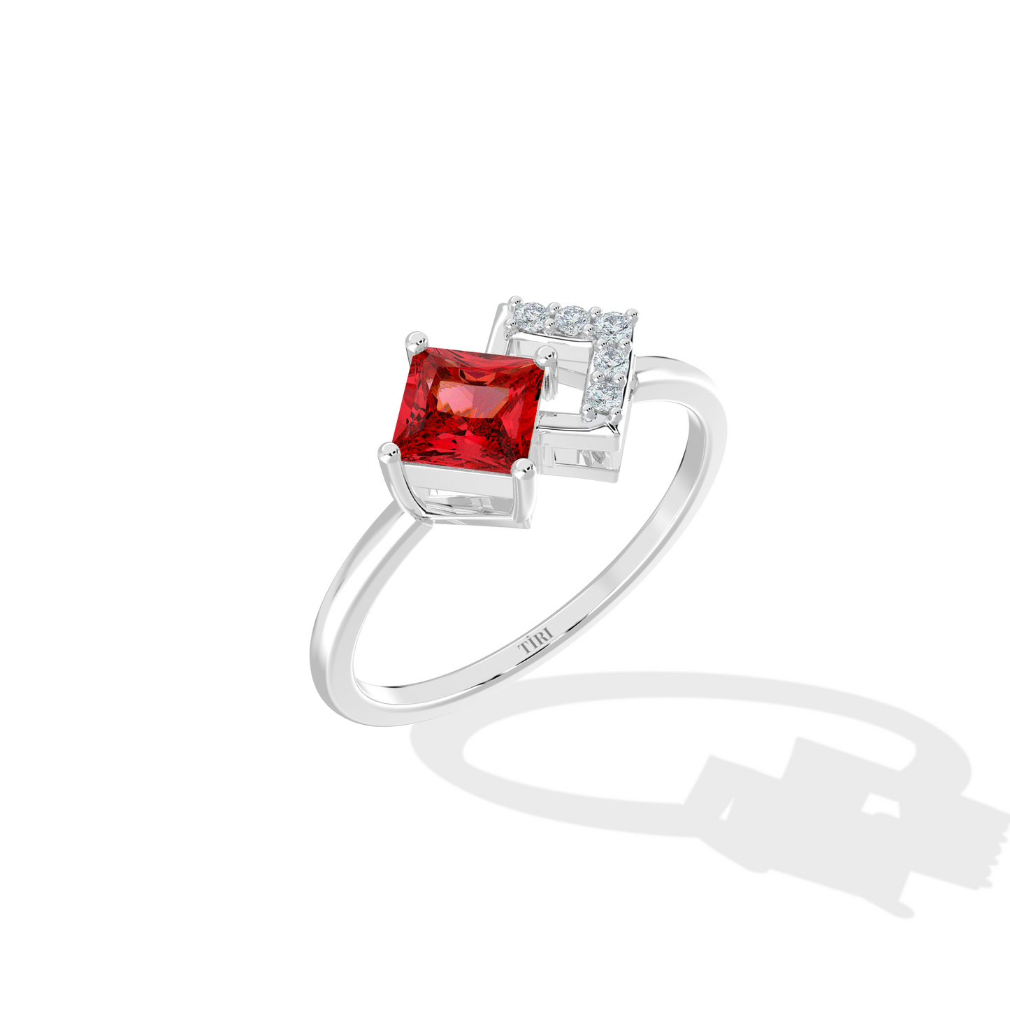 Elegant silver ring with princess-cut red gemstone and pave diamond geometric setting on white background