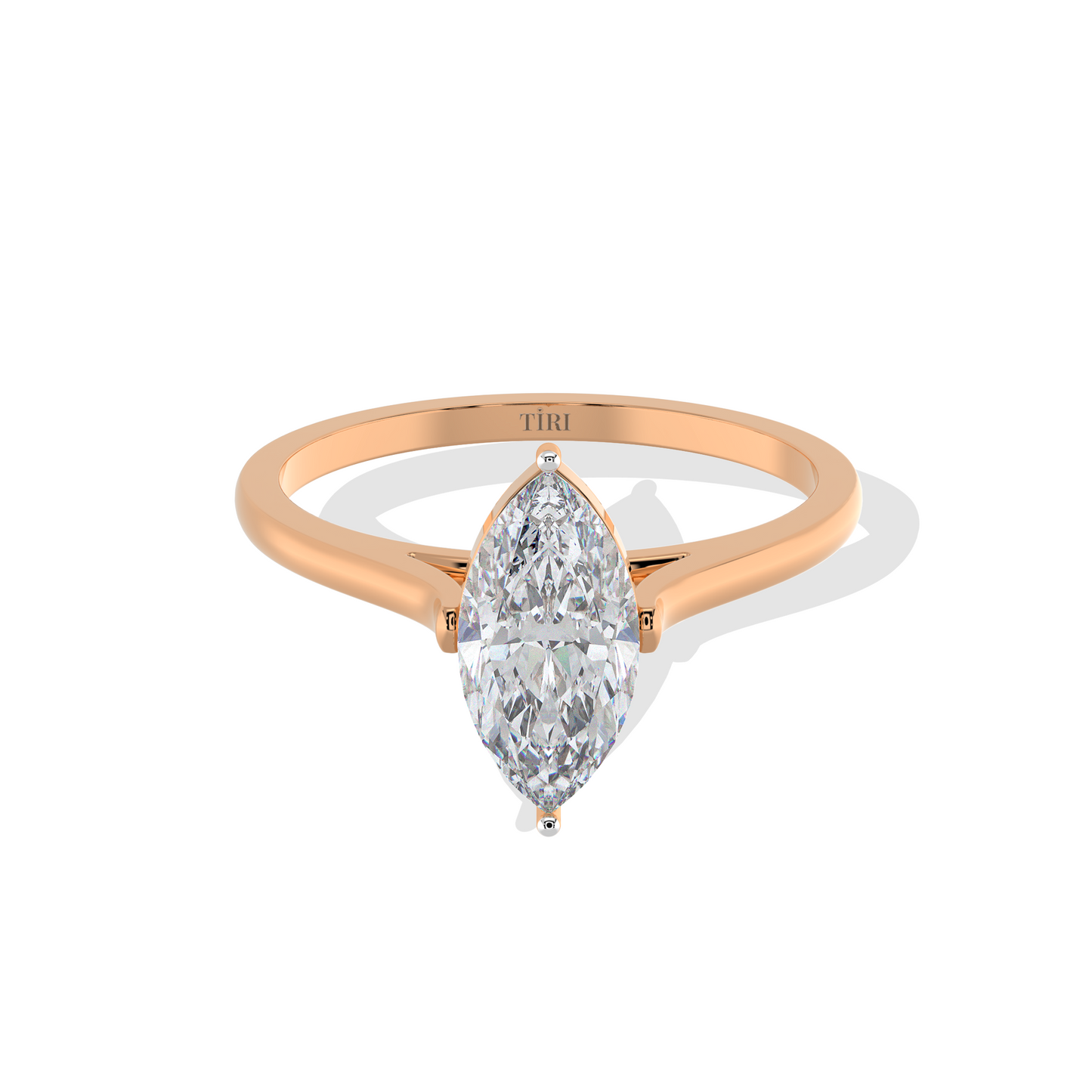 Marquise diamond ring in rose gold setting with delicate band, ideal for engagement or wedding