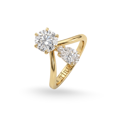 Twin Soul round pear cut diamond ring by Tiri featuring a sparkling pear-shaped diamond on a sleek band.