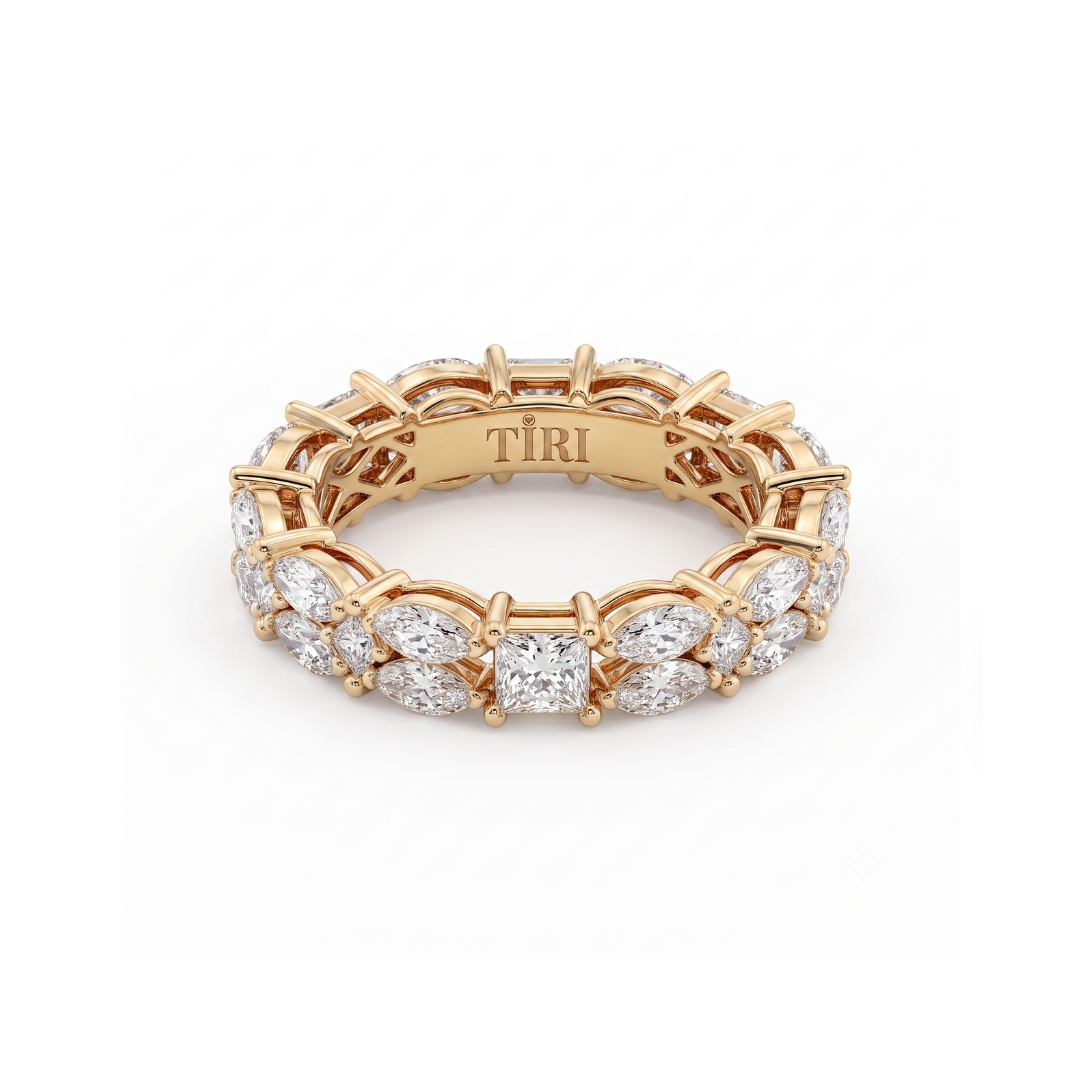 Tiri Marquisate Band diamond ring with a sleek gold band and a prominent marquise-shaped diamond centerpiece.