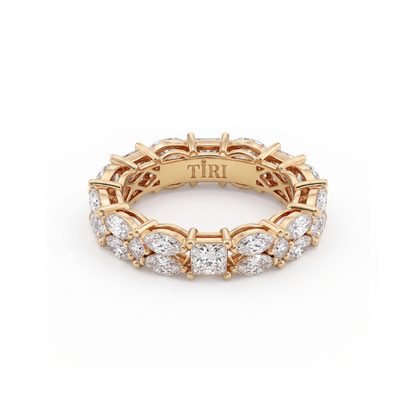 Tiri Marquisate Band diamond ring with a sleek gold band and a prominent marquise-shaped diamond centerpiece.