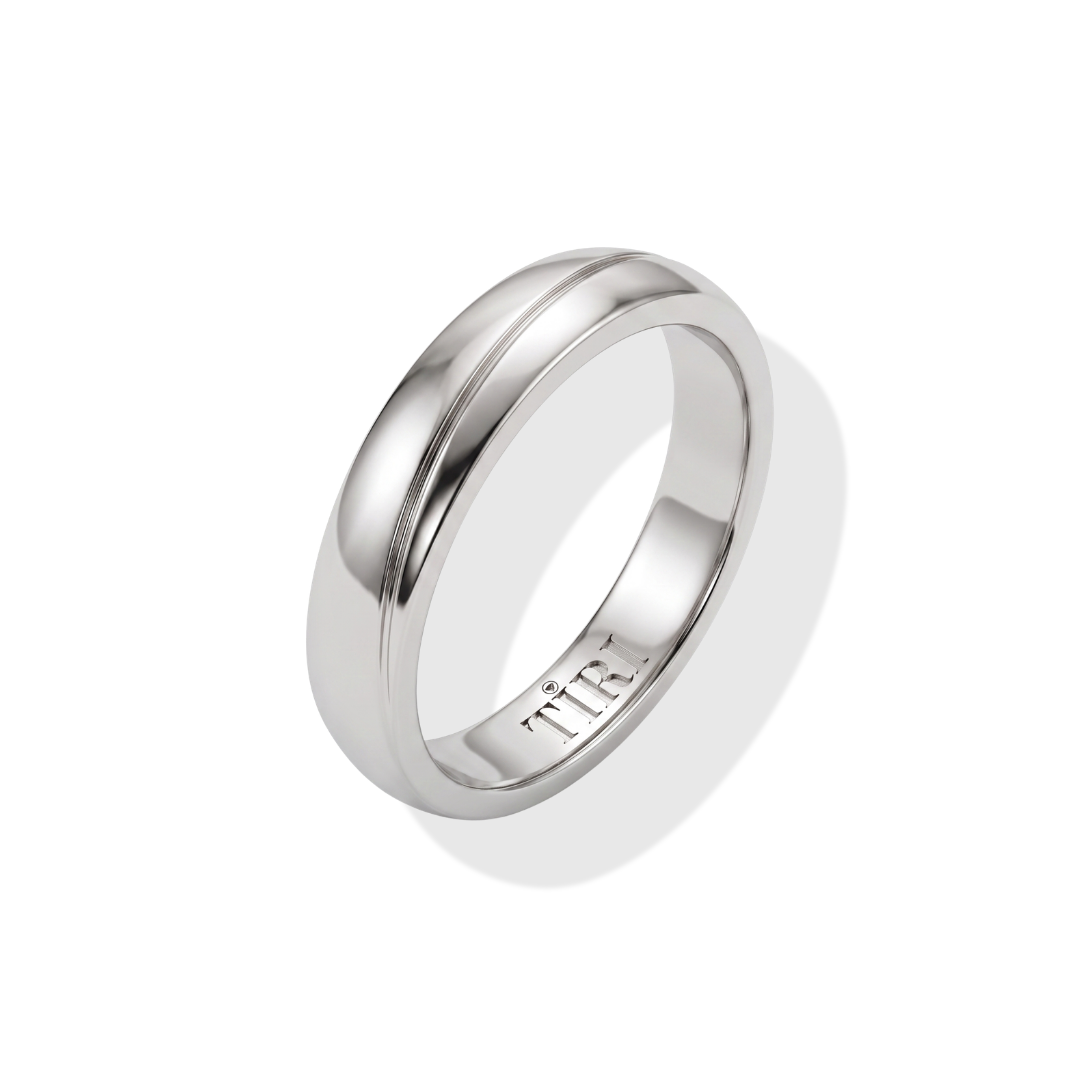 Men's gold band ring by Tiri featuring a sleek, polished gold finish and smooth circular design.