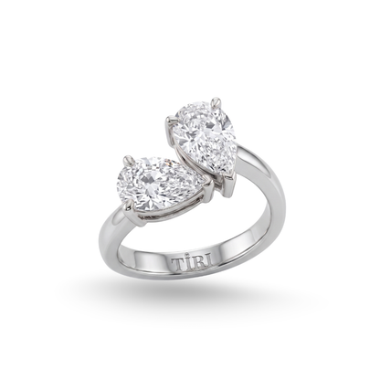 Tiri You-and-Me Pear Cut Diamond Ring featuring a sparkling pear-shaped diamond set in elegant band.