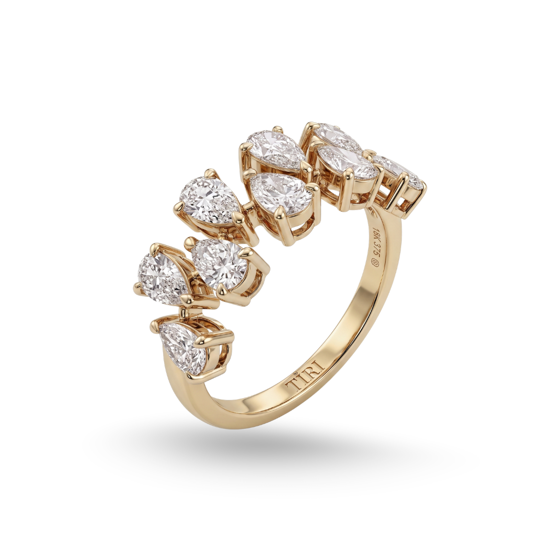 Tiri Lumina pear-shaped diamond ring with a sparkling center stone and elegant band, showcasing fine jewelry craftsmanship.