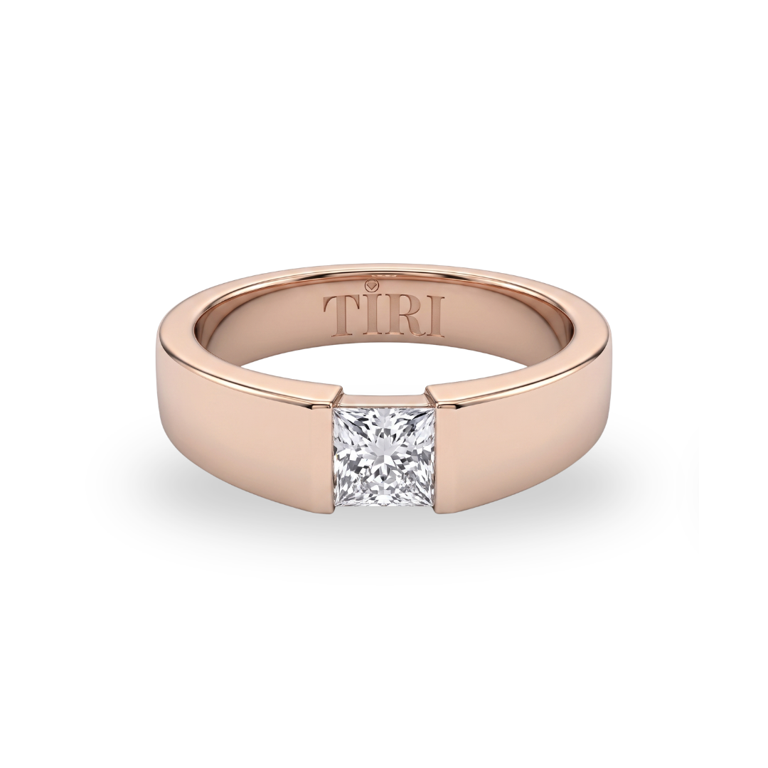 Tiri Quadrant Solitaire Men Diamond Ring featuring a central diamond set in a sleek, polished metal band.