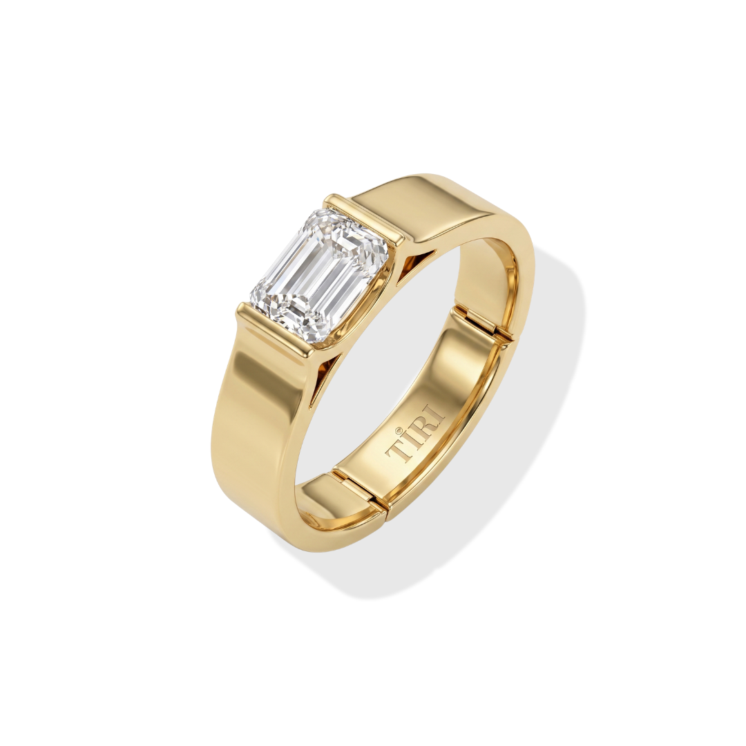 Tiri men's block style band ring made of polished metal with a modern, geometric design on a white background.