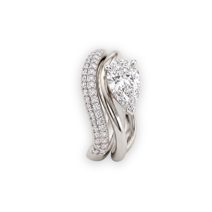 Tiri Solis Pear Diamond Ring featuring a sparkling pear-shaped diamond set in elegant band.
