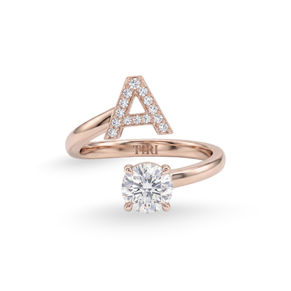 Tiri monogram solitaire diamond ring with a single sparkling diamond set in a sleek band, elegant jewelry for special occasions.