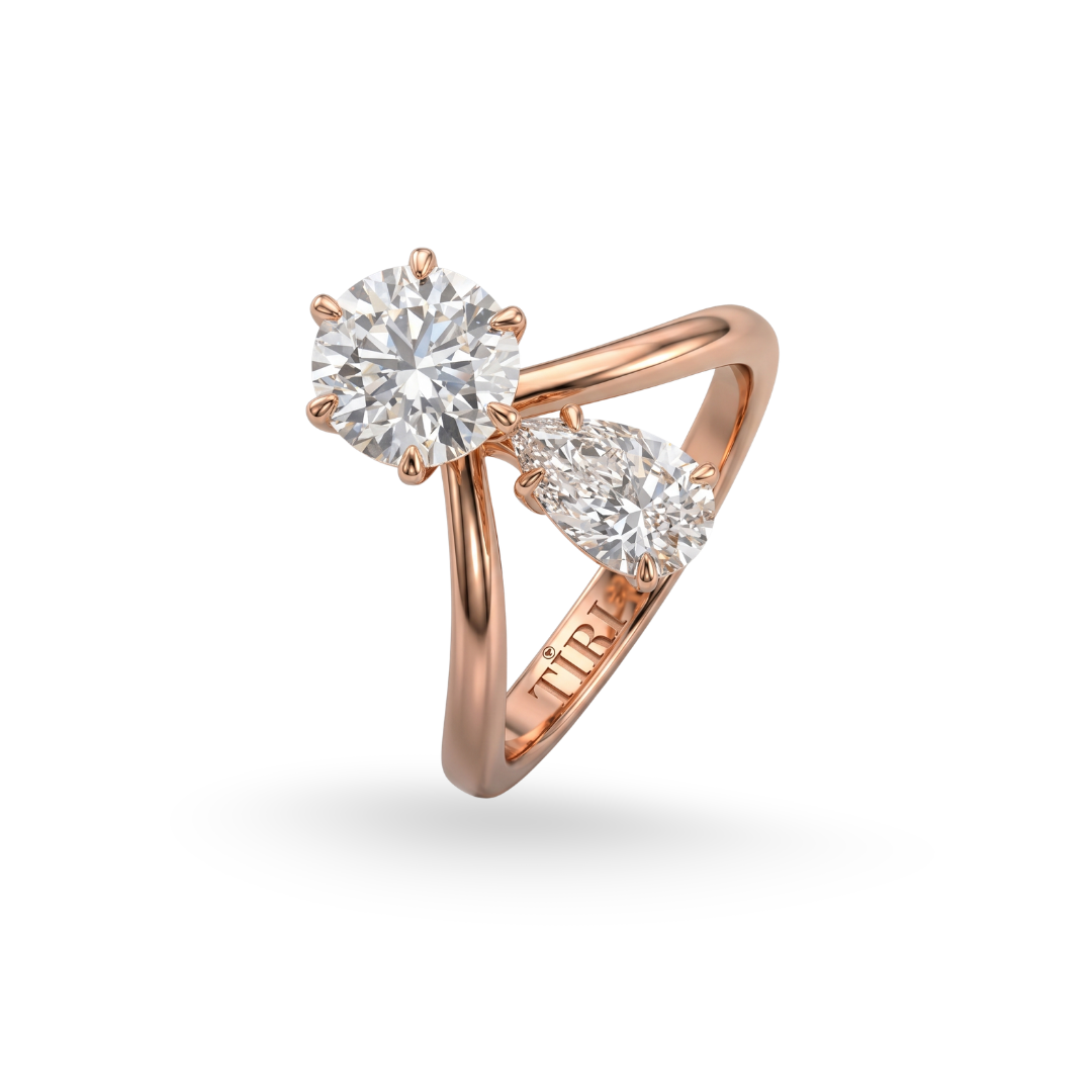 Tiri Twin Soul round pear cut diamond ring featuring a sparkling pear-shaped diamond set on a sleek band.