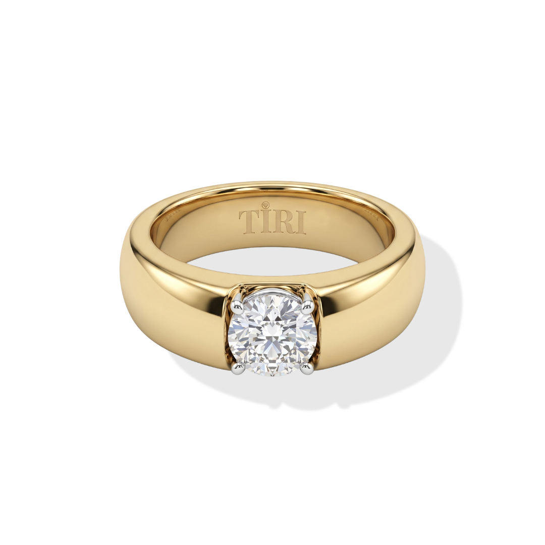 Tiri Classic Heritage Band Ring in polished metal with a sleek, timeless design, shown on a neutral background.
