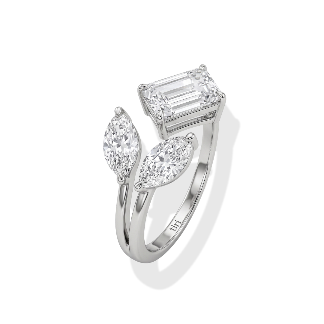 Tiri Marquise and Emerald Duo Diamond Ring featuring a marquise-cut and emerald-cut diamonds in a sleek band.