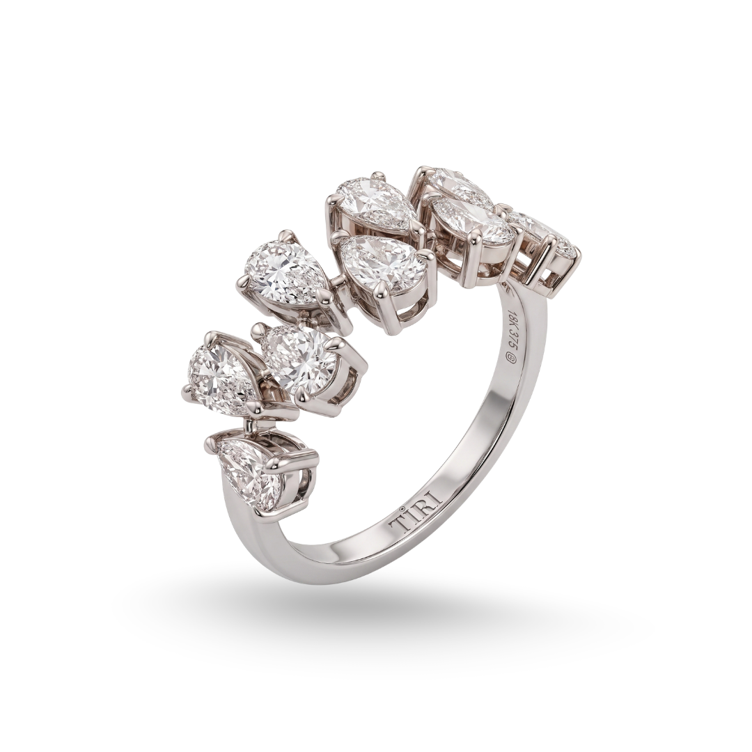 Tiri Lumina Pear Cut Diamond Ring featuring a sparkling pear-shaped diamond set on a sleek band.