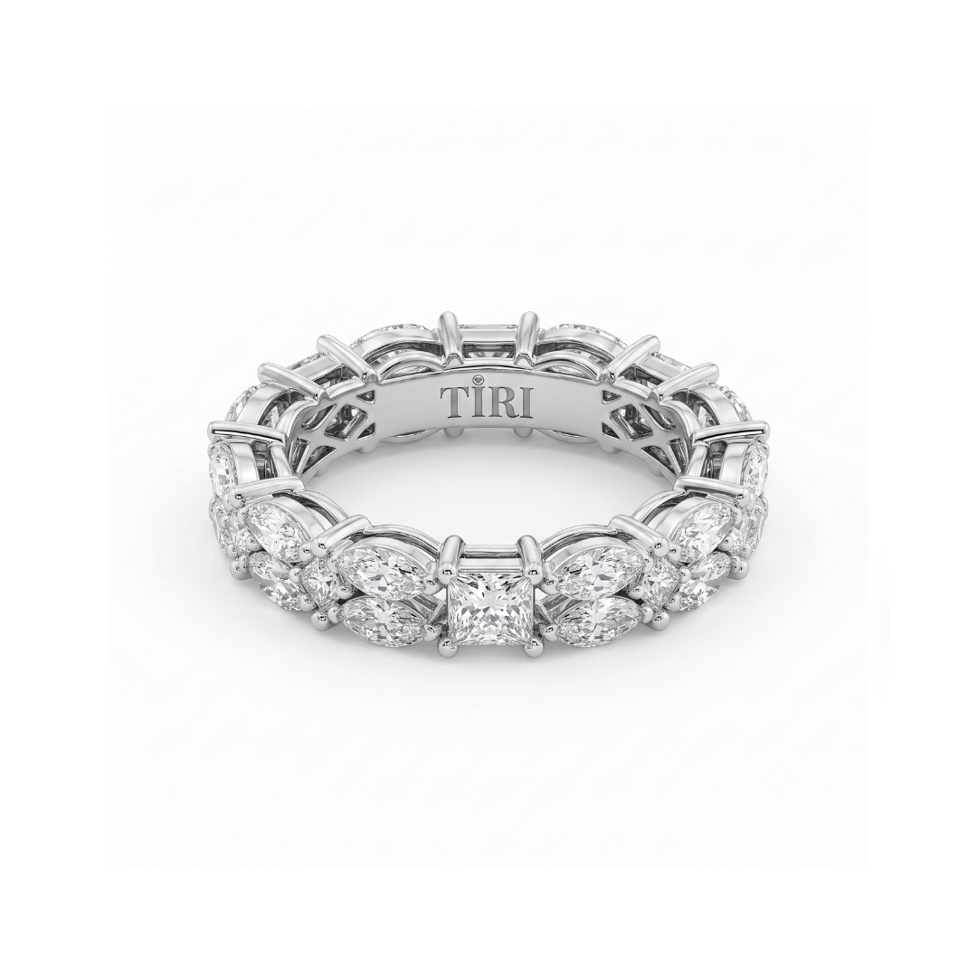 Tiri Marquisate Band Diamond Ring featuring a sleek design with sparkling diamonds on a polished band.