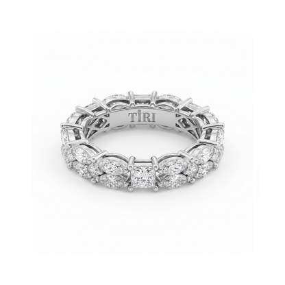 Tiri Marquisate Band Diamond Ring featuring a sleek design with sparkling diamonds on a polished band.