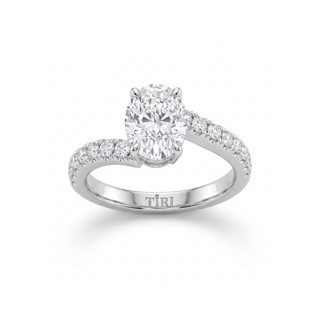 Tiri oval engagement diamond ring with a central sparkling diamond set in a sleek band, elegant and finely crafted.