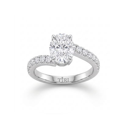Tiri oval engagement diamond ring with a central sparkling diamond set in a sleek band, elegant and finely crafted.