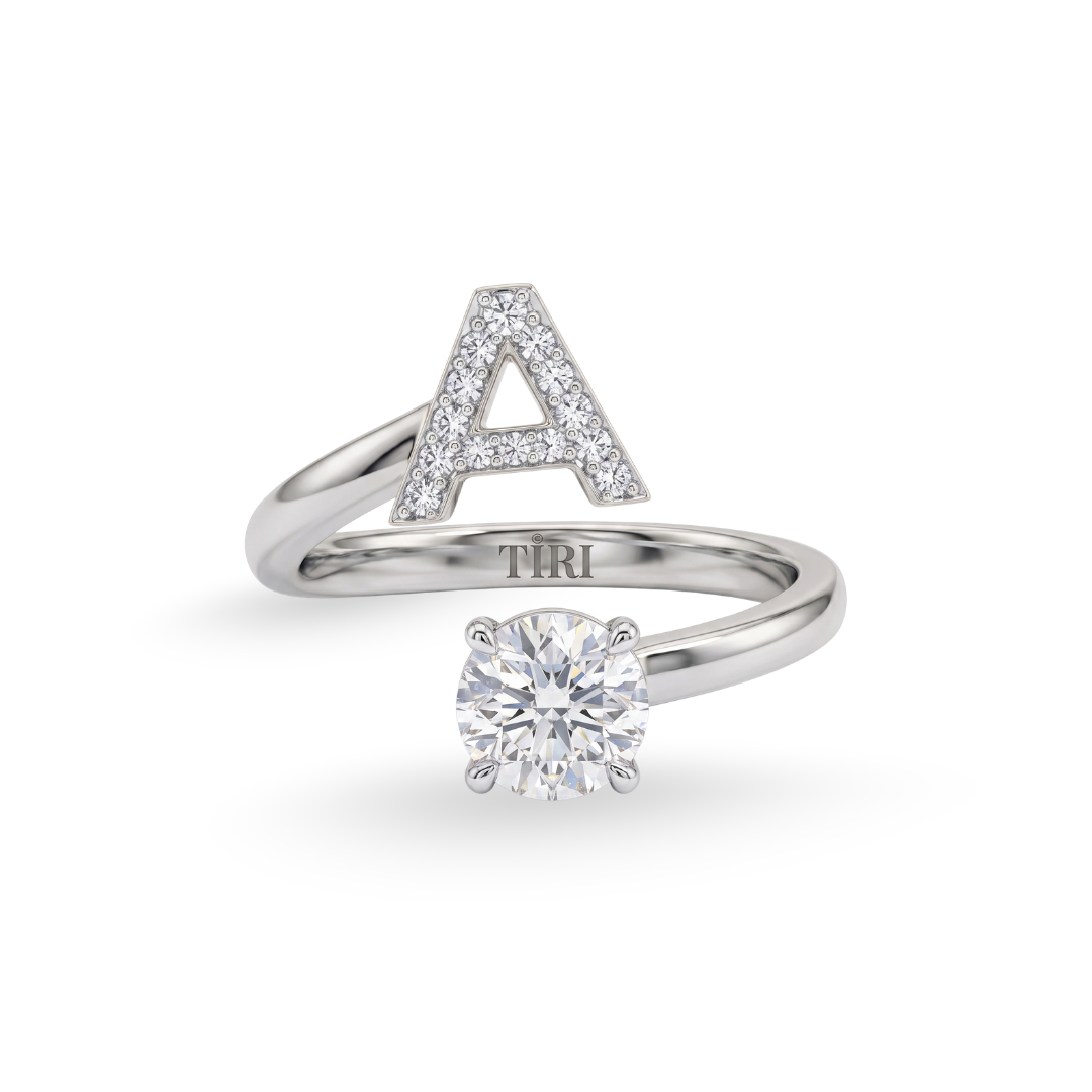 Tiri Monogram Solitaire Diamond Ring featuring a single sparkling diamond set in a sleek band.