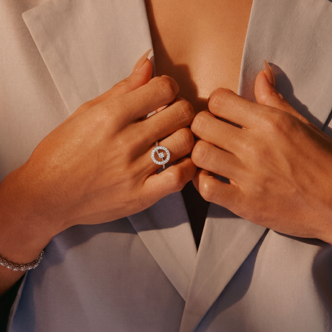 Silver Infinity Node Ring by Tiri showing a sleek, polished band with infinity and node design on a white background.