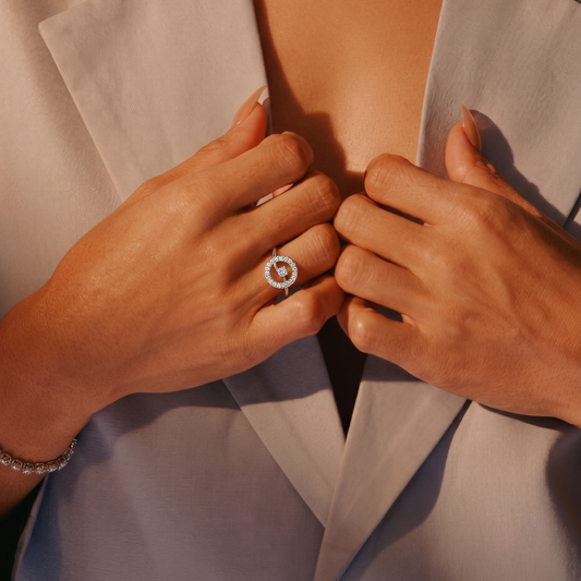 Silver Infinity Node Ring by Tiri showing a sleek, polished band with infinity and node design on a white background.