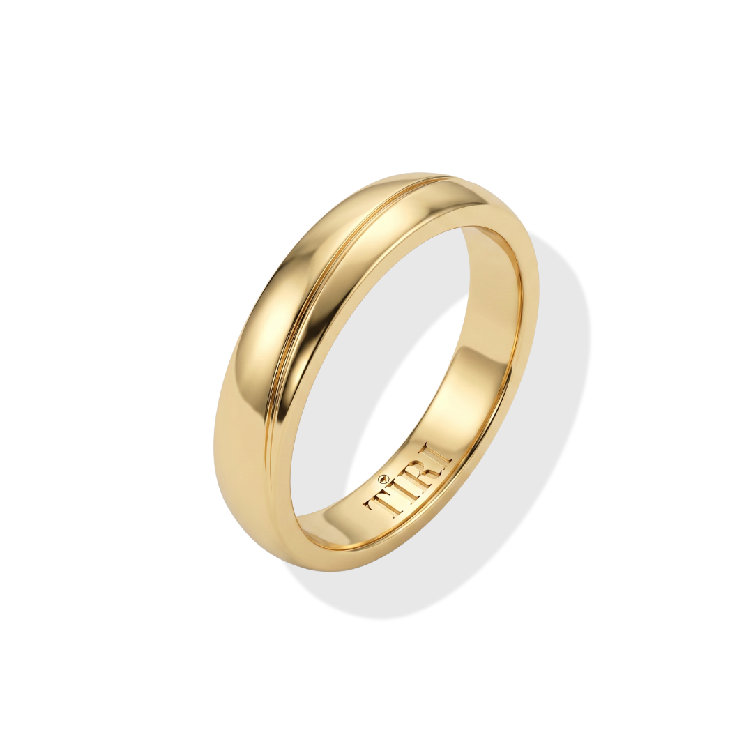 Men's gold band ring by Tiri featuring a smooth, polished gold finish and classic design on a plain background.