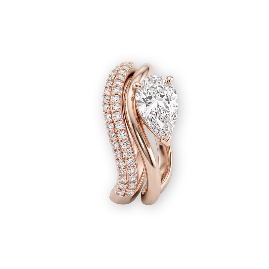 Tiri Solis Pear Diamond Ring featuring a pear-shaped diamond set in a sleek band, elegant jewelry for special occasions.