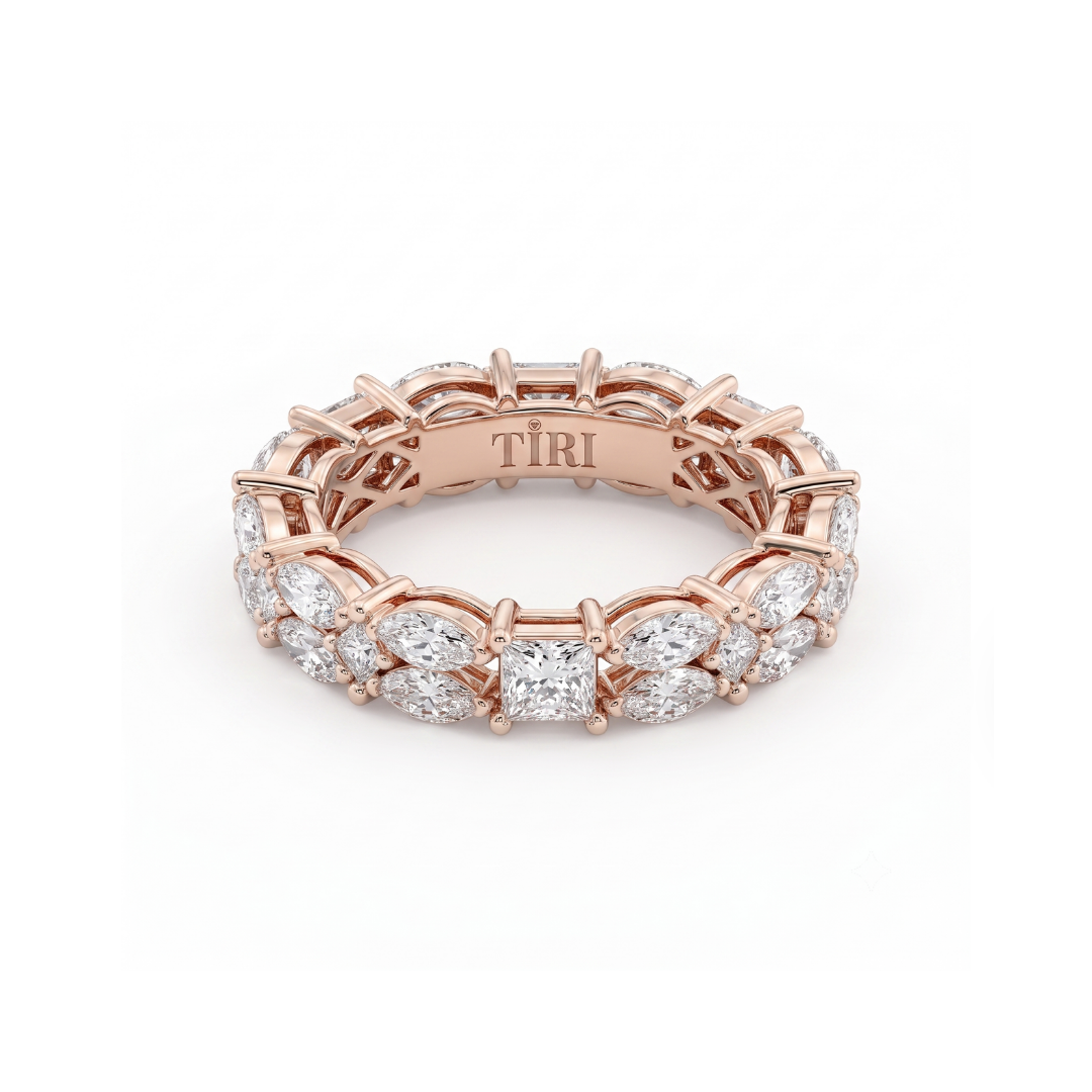 Tiri Marquisate Band Diamond Ring featuring a sleek design with sparkling diamonds on a polished band.
