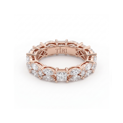 Tiri Marquisate Band Diamond Ring featuring a sleek design with sparkling diamonds on a polished band.
