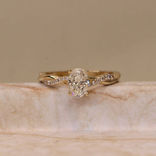 Tiri 1.45 TW diamond ring with a sparkling diamond centerpiece and elegant band, showcasing fine jewelry craftsmanship.