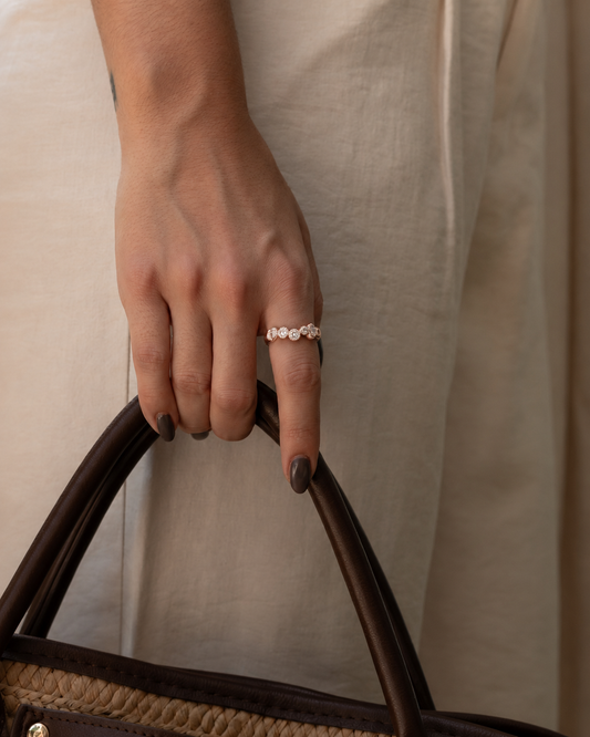 Tiri 0.90 carat TW diamond ring featuring a sparkling diamond centerpiece and elegant band design.