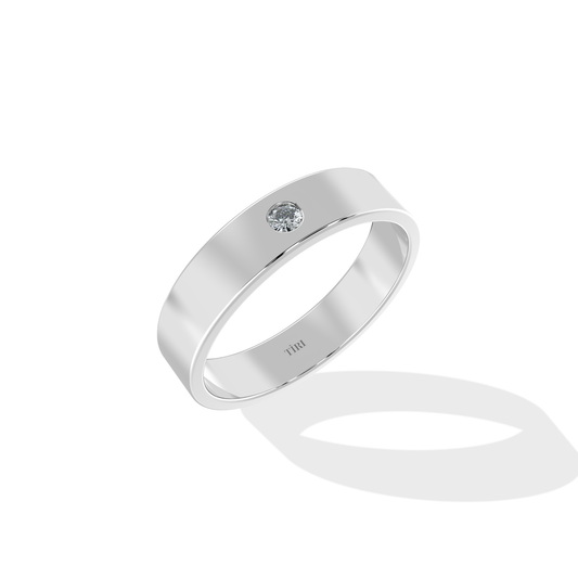 Tiri 0.20 TW diamond ring featuring a sleek band with sparkling diamonds and a polished silver finish.