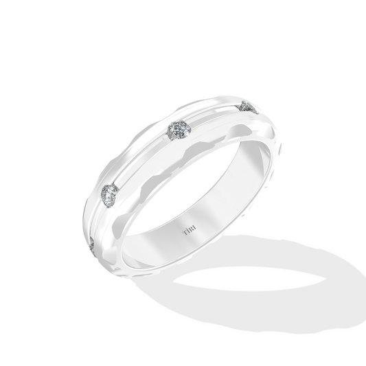 Tiri 0.10 TW diamond ring featuring a sleek band with sparkling diamonds set in a modern design.