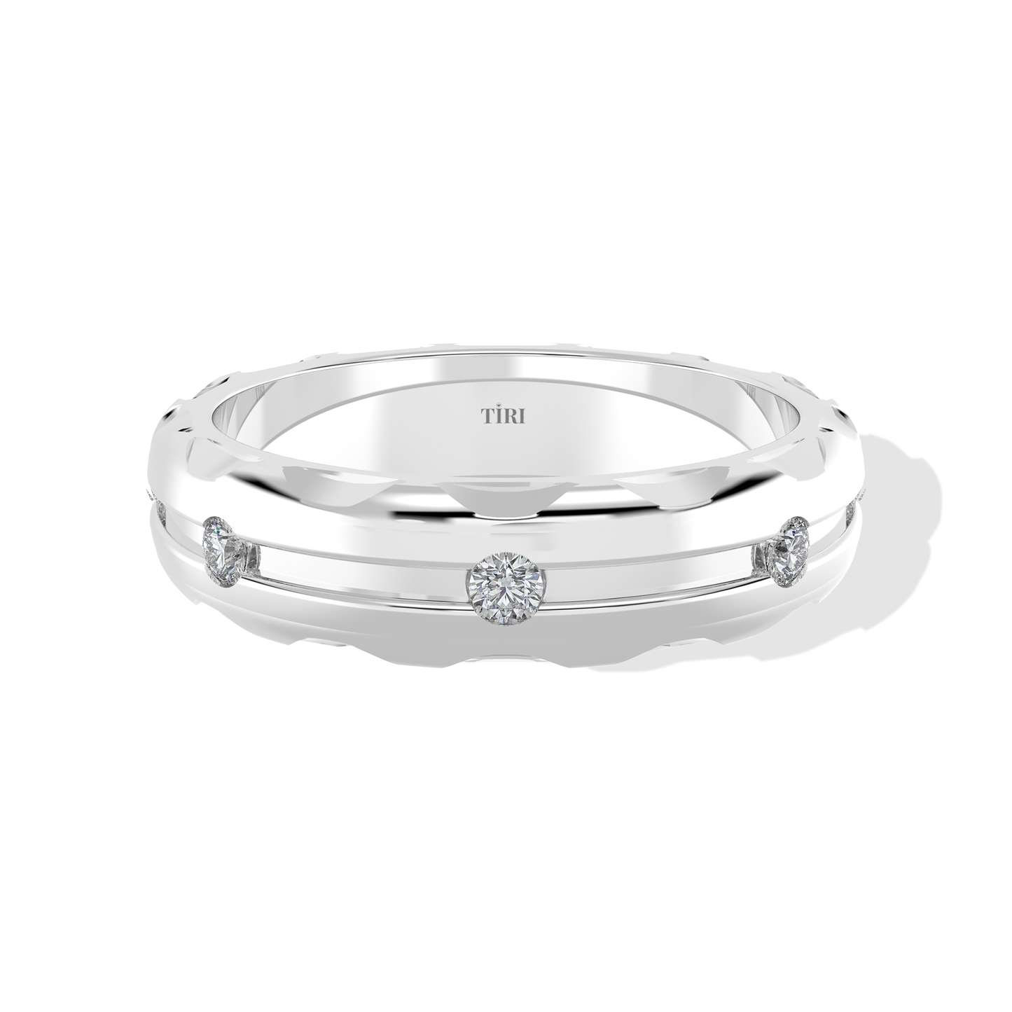 Tiri 0.10 TW diamond ring featuring a sleek band with sparkling diamonds set in a polished metal finish.