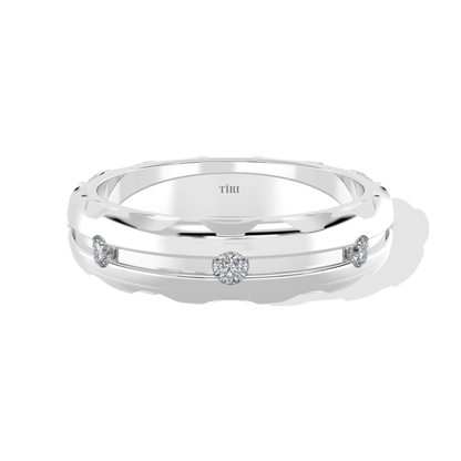 Tiri 0.10 TW diamond ring featuring a sleek band with sparkling diamonds set in a polished metal finish.