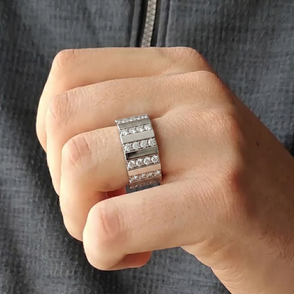 Tiri Atlas Band Diamond Ring featuring a sleek band with sparkling diamonds on a white background.