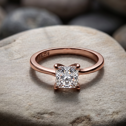 Tiri princess cut solitaire diamond ring with a sparkling center diamond and sleek band, elegant jewelry for special occasions.