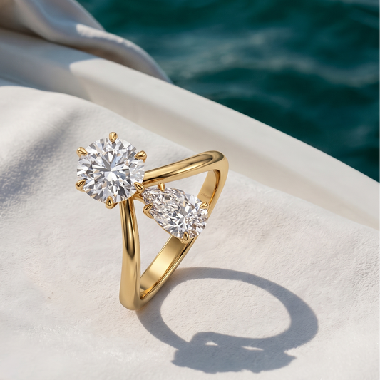 Tiri Twin Soul round pear cut diamond ring featuring a sparkling pear-shaped diamond set in a sleek band.