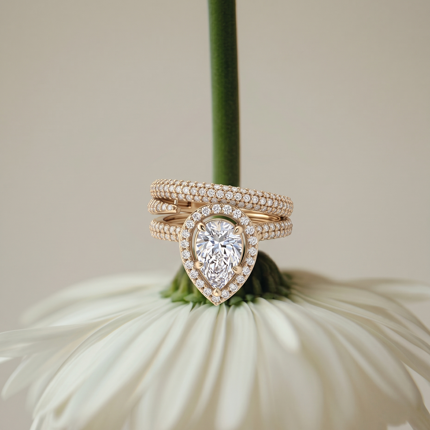 Tiri Empress Pear Diamond Ring featuring a large pear-shaped diamond set in a delicate band on a white background.