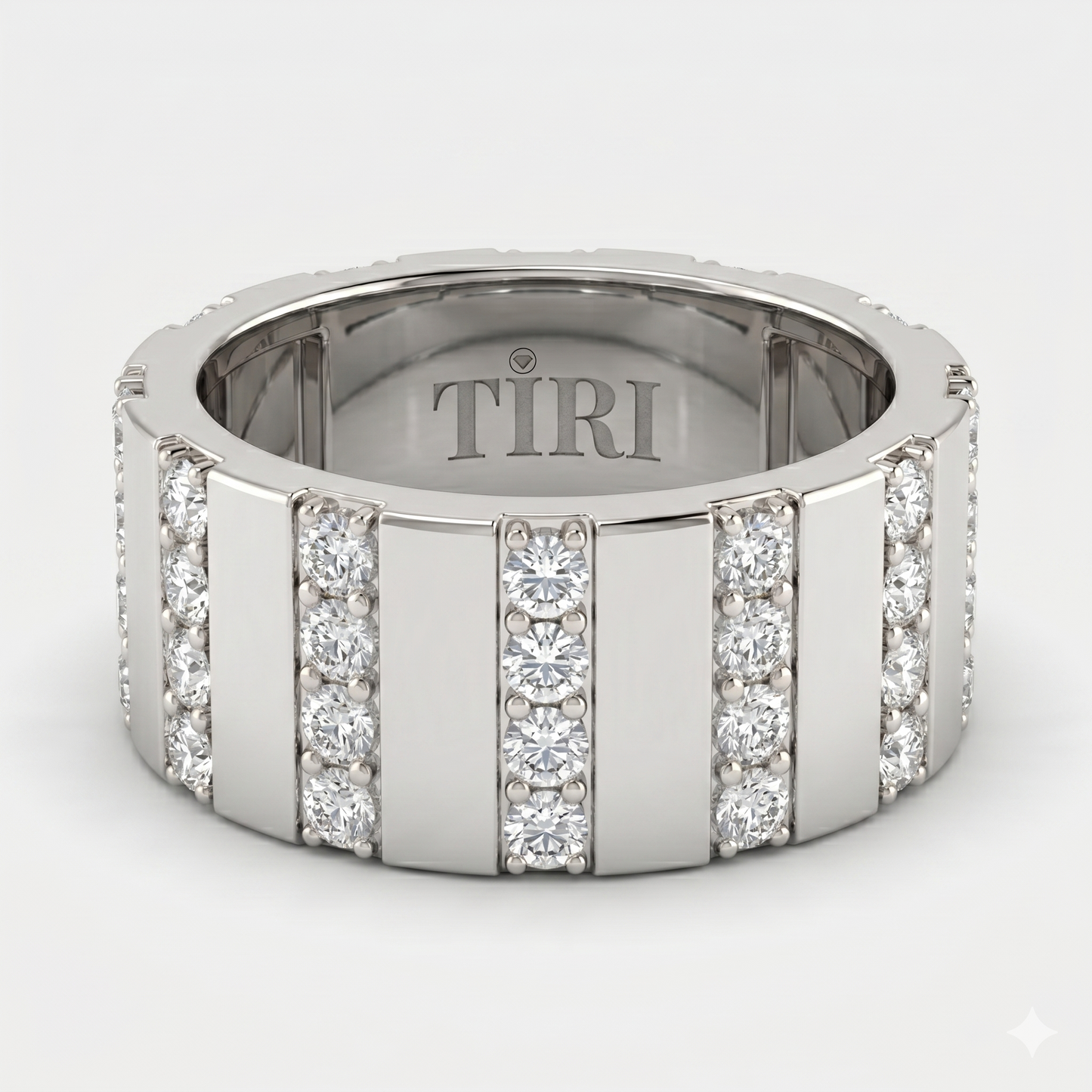 Tiri The Atlas Band Diamond Ring with sparkling diamonds and sleek band design, displayed on a white background.