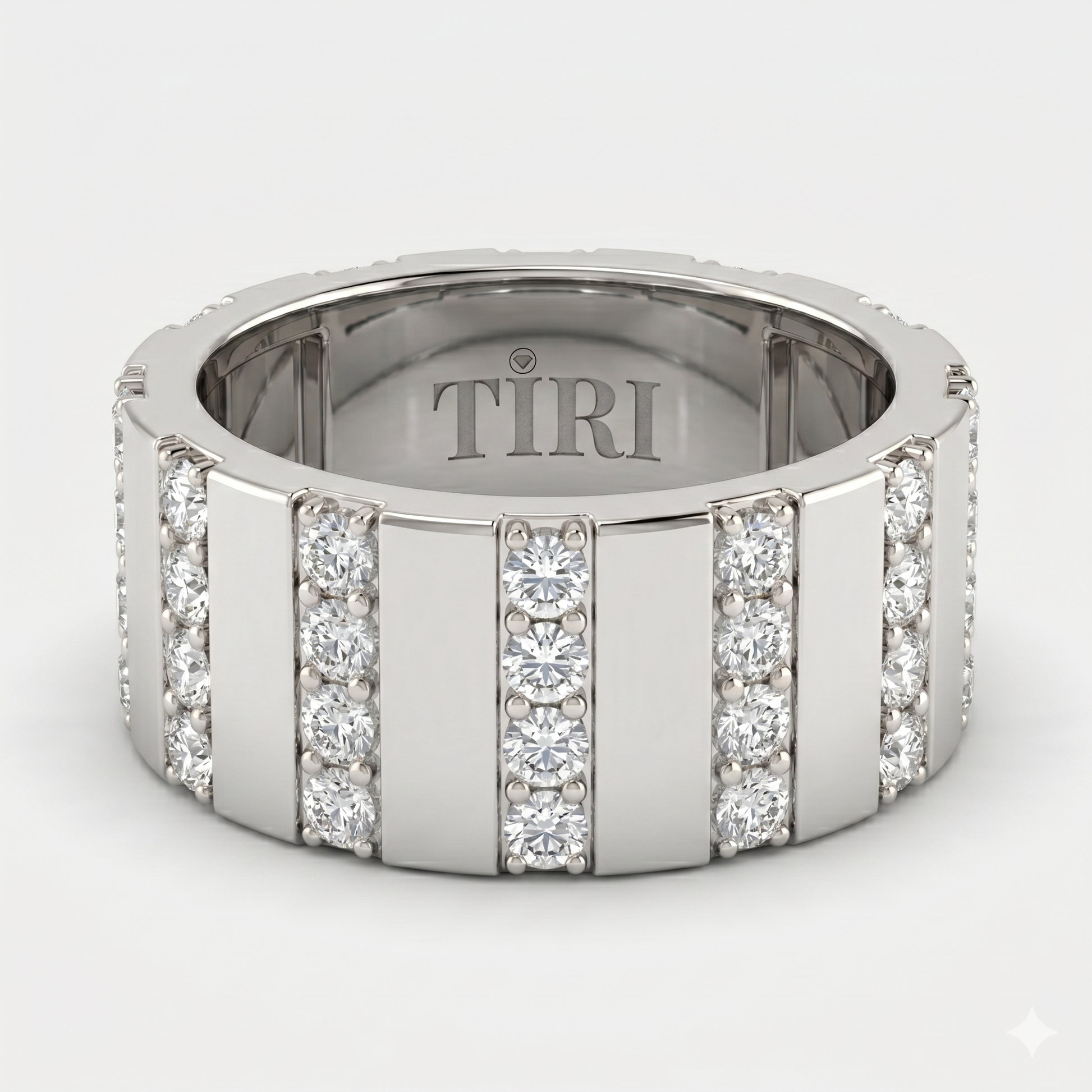 Tiri The Atlas Band Diamond Ring with sparkling diamonds and sleek band design, displayed on a white background.