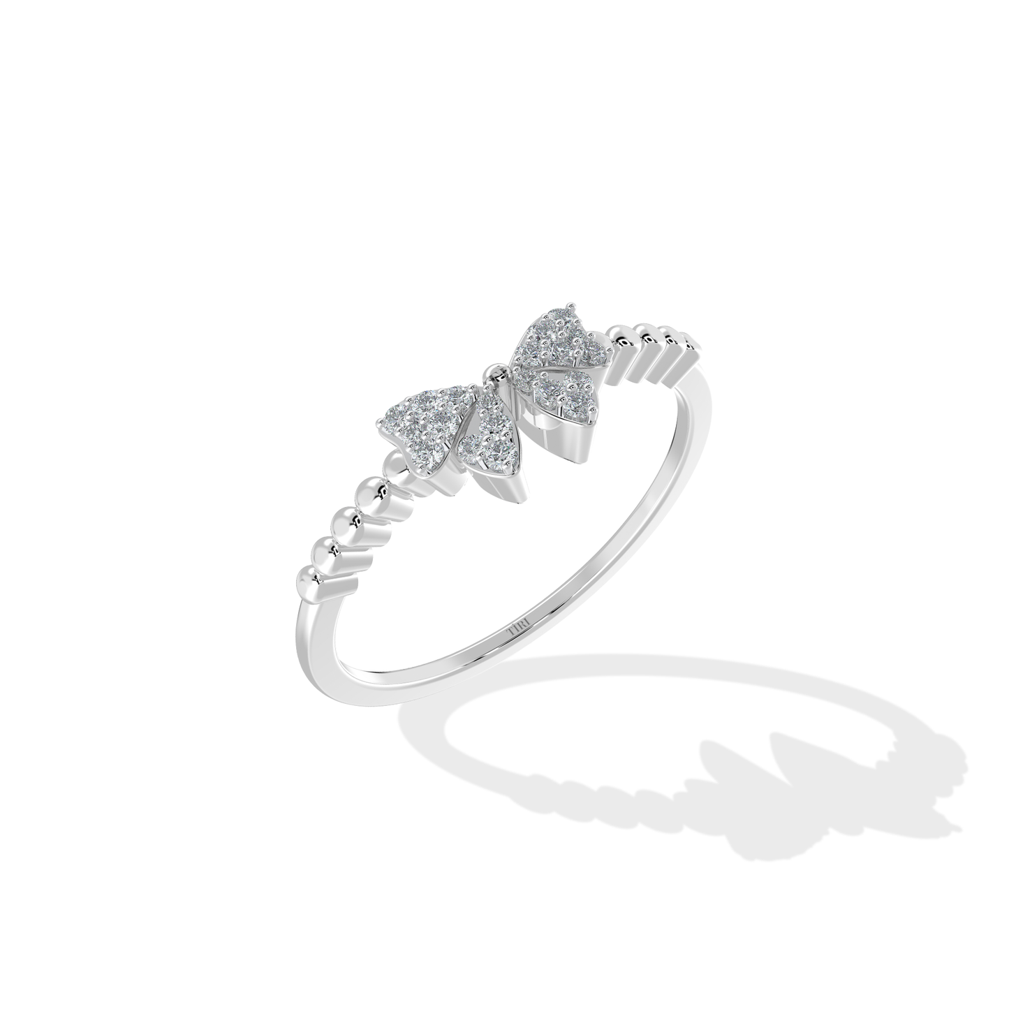 Tiri 0.20 TW diamond ring featuring a sleek band with sparkling diamonds set in a polished metal finish.