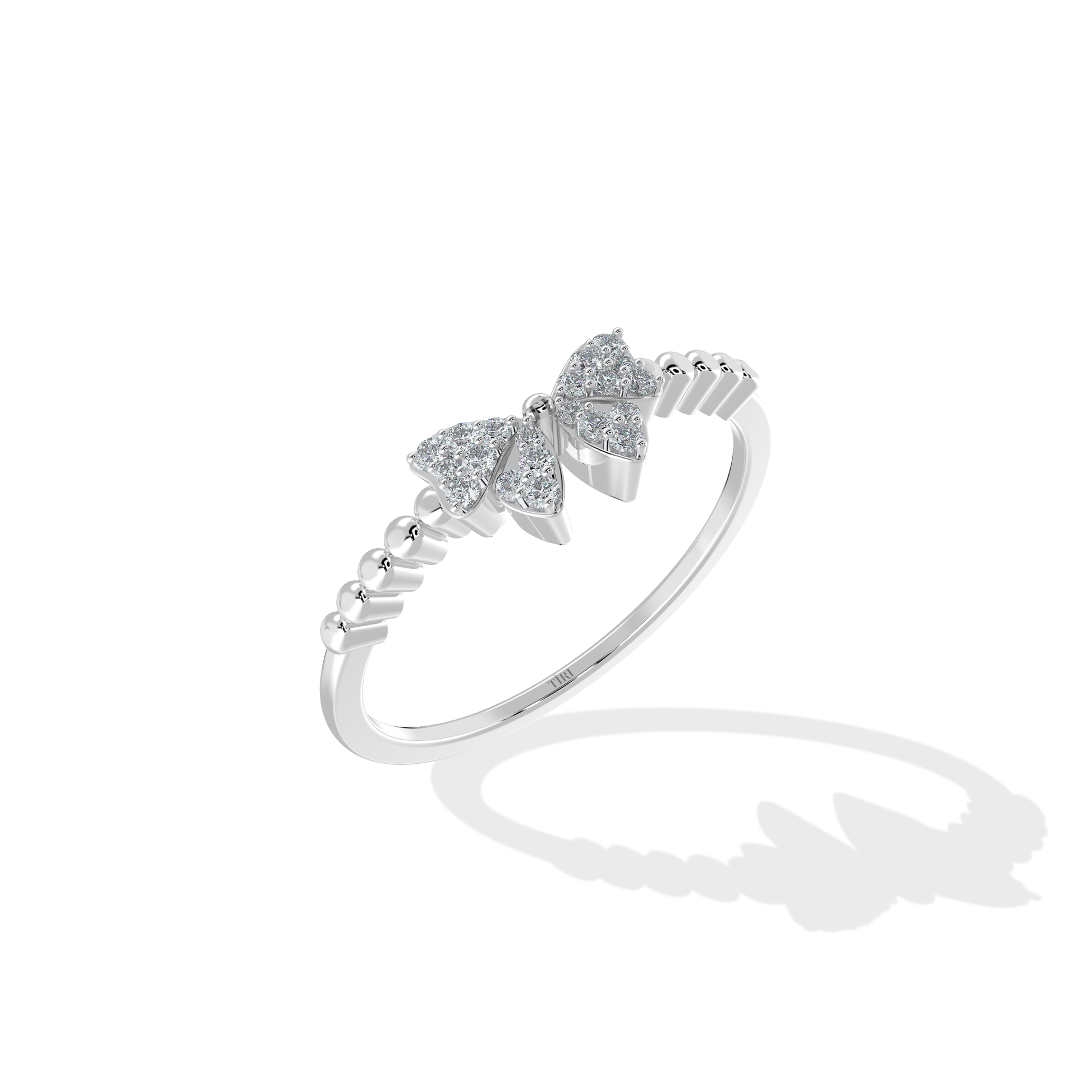 Tiri 0.20 TW diamond ring featuring a sleek band with sparkling diamonds set in a polished metal finish.