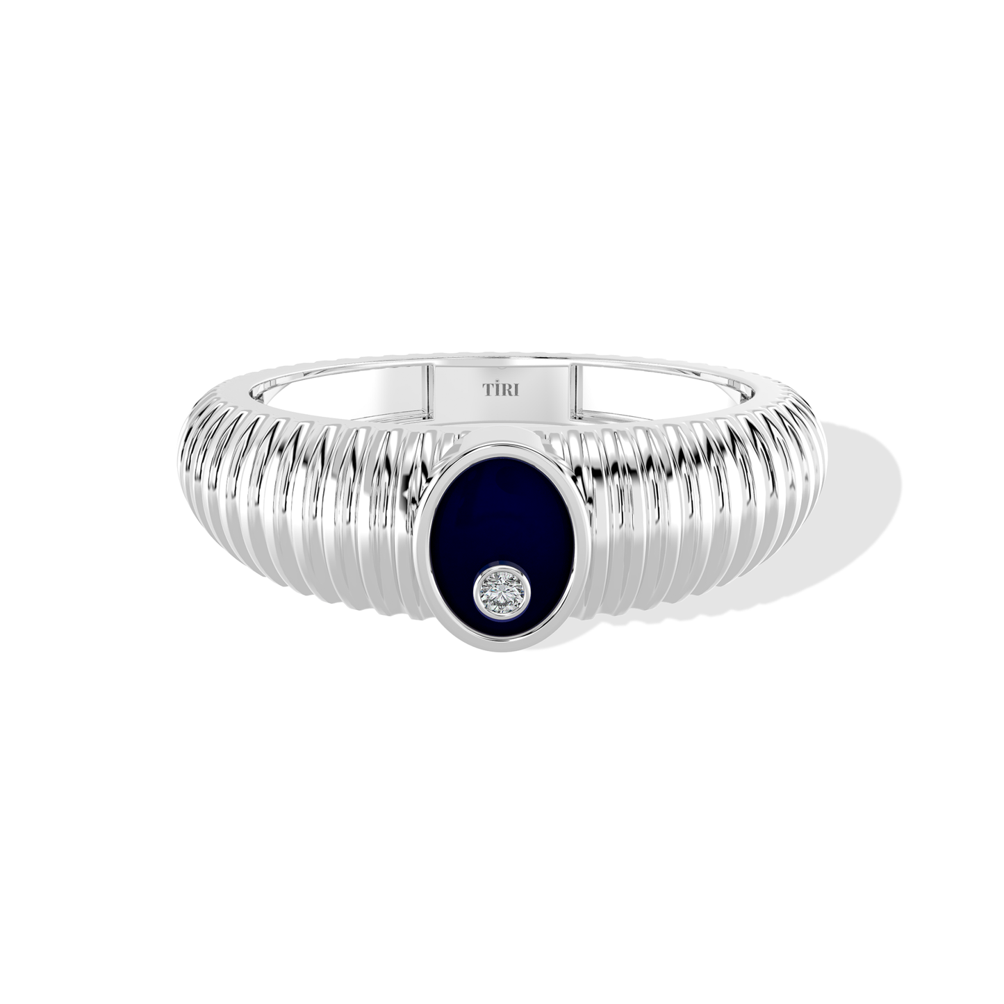 Tiri 0.10 TW diamond ring featuring a sleek band and sparkling diamonds on a white background.