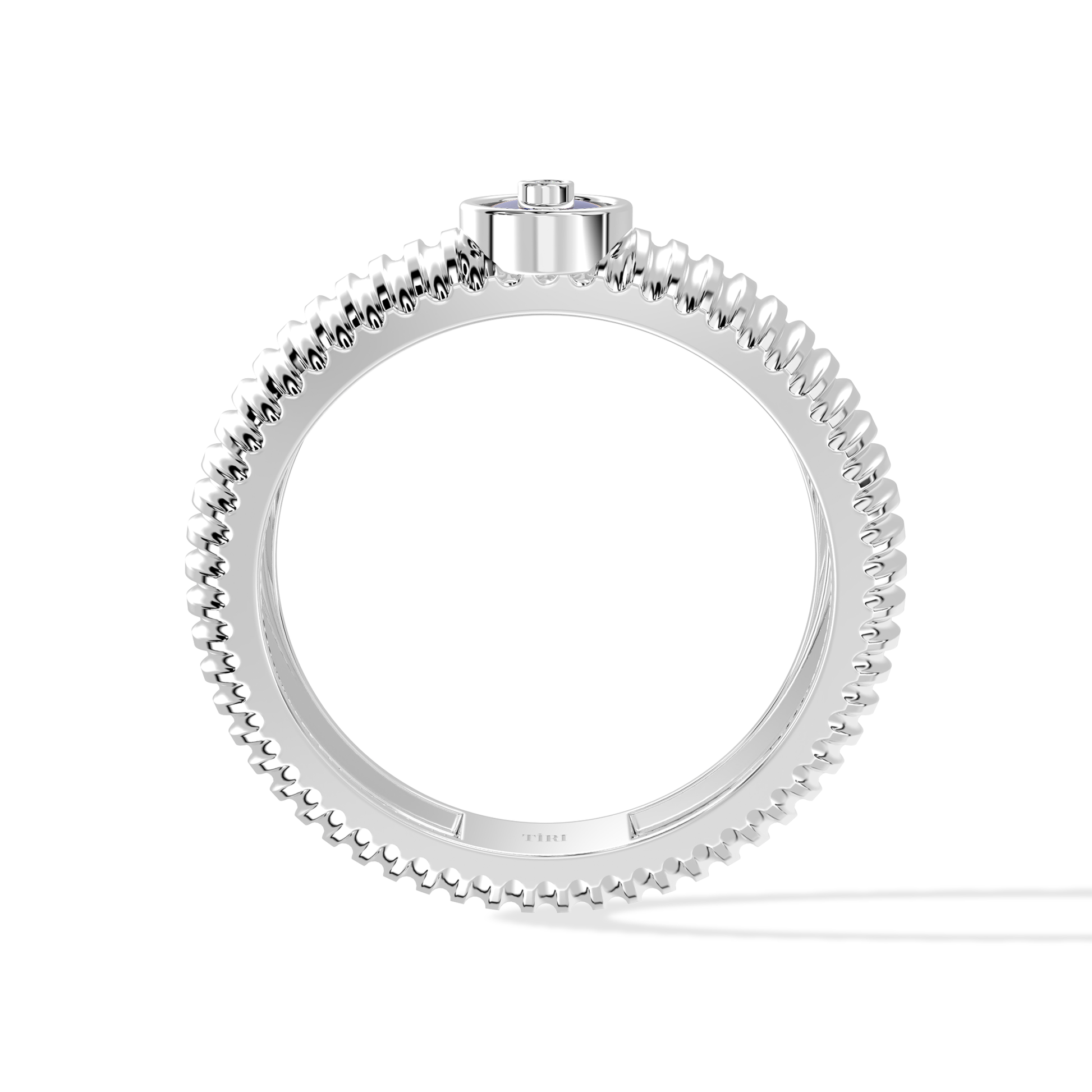 Tiri 0.10 TW diamond ring featuring a sleek band with sparkling diamonds set in a stylish design.