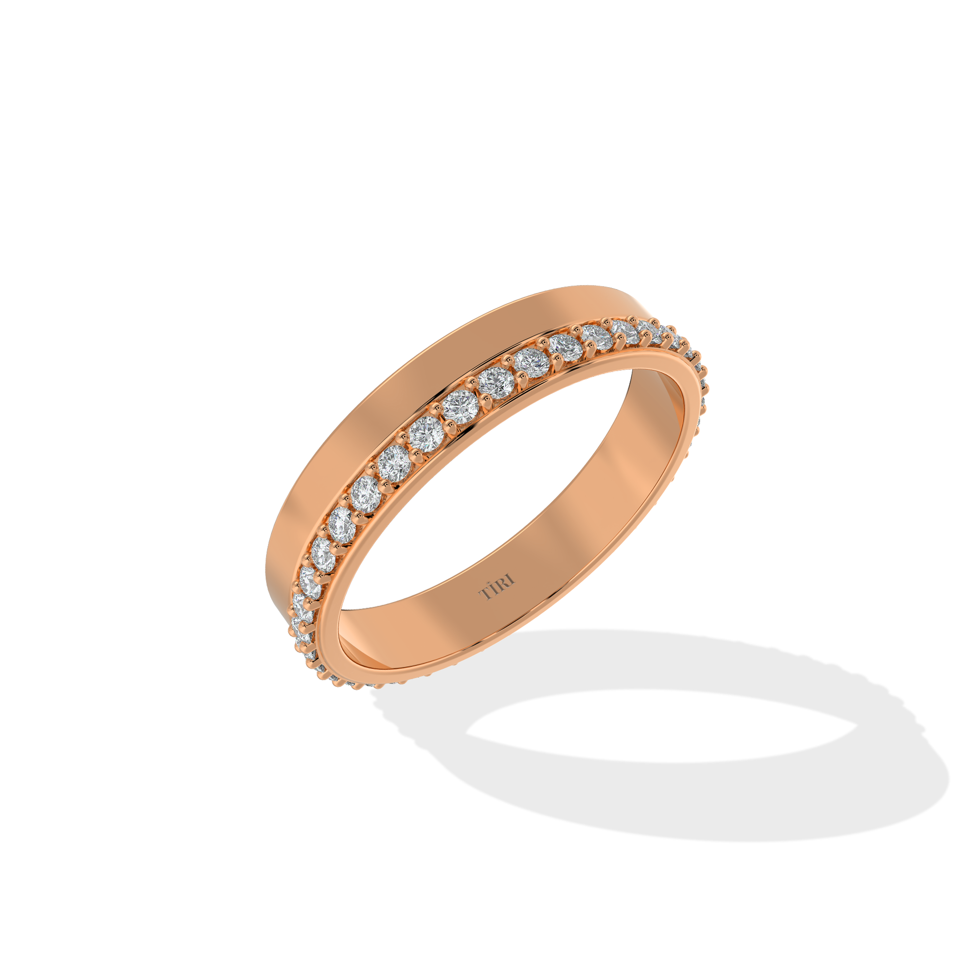 Tiri 0.65 TW diamond ring featuring a sleek band with sparkling diamonds set in a classic design.