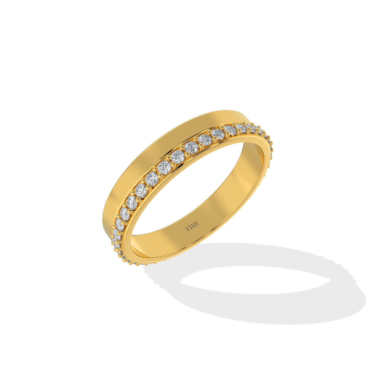 Tiri 0.65 carat diamond ring with a sleek band, showcasing a sparkling diamond centerpiece on a white background.