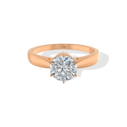Tiri 1.00 TW diamond ring featuring a sparkling central diamond set in a sleek gold band