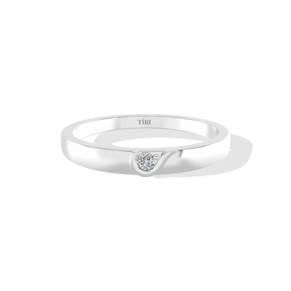 Elegant 0.20 TW diamond ring by Tiri showcasing a sparkling central diamond and sleek silver band.