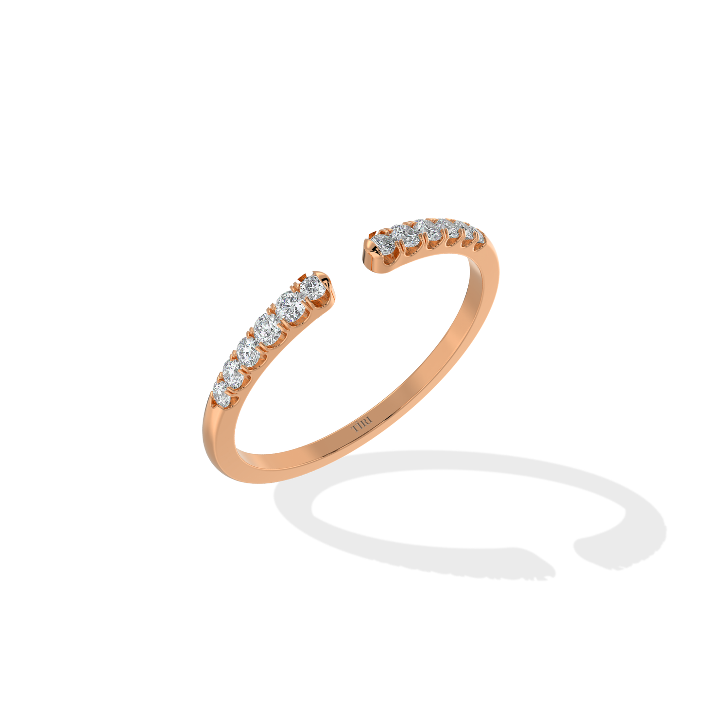 Tiri 0.20 TW diamond ring with a sleek band and sparkling diamonds, showcasing elegant jewelry design.